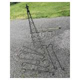 Trellis, iron fence, & plant hangers