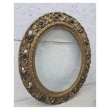 Oval guilded frame