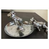 Mack bulldogs. One ashtray, one off of the truck