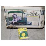 Dog bed and 20 ft dog tie out - The box is in