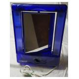 Lighted makeup or face paint mirror.  Great for