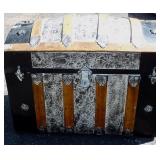 Antique dome top trunk. Wood and tin (metal).