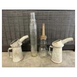 Oil bottles & cans and old wrenches- some Ford