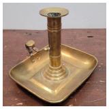 Brass push-up candlestick