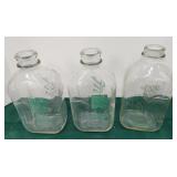 3 half gallon milk bottles