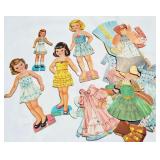 Vintage paper dolls with lace-on clothing and