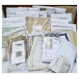 Box lot NIP curtains and valances. Assorted sizes
