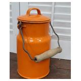 Orange enamelware cream can made in Poland