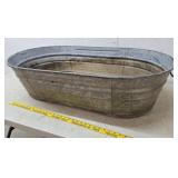 Wheeling wash tub holes in bottom