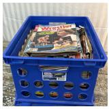 Crate of vintage wrestling magazines