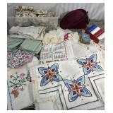 Vintage linens, pre-wrapped gift boxes, wool