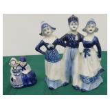 Two blue and white figures delft