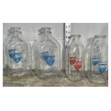 4 glass milk bottles - All Star Daires,
