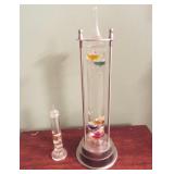 Large and small Galileo glass thermometers. Large