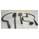 Pipe wrench, hammer, scythe