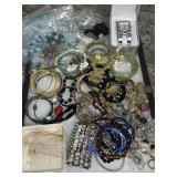Bracelets, watch and watch parts, hair combs,