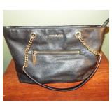 Michael Kors black and gold purse. Will need