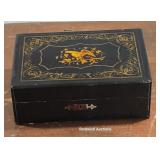 Gold over black decorated stationary box