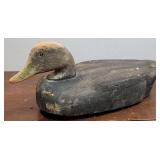 Large carved glass eyes decoy duck