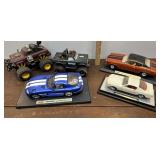 3 Die Cast cars abs 2 monster Trucks - Castline,