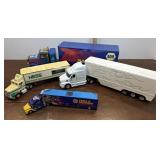 4 truck and trailers - Hess, Napa, etc
