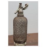 Wire wrapped seltzer bottle