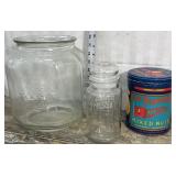 Planter peanut tins and glass jar, Peanuts