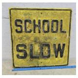 Embossed school slow sign