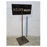 Steel police sign
