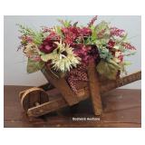 Wooden wheelbarrow floral arrangement