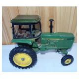 Vintage John Deere 4440 (4450?) die cast tractor.