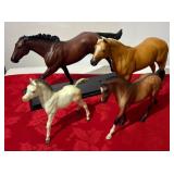 4 Breyer horses. Including American Pharoah