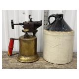 Vintage brass torch and crock jug