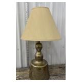 Gold tone lamp with shade