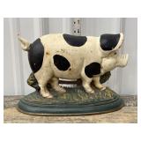 Cast iron pig door stop
