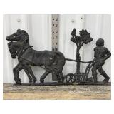 Cast iron horse pull plow wall hanging