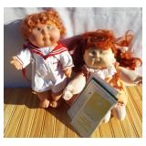 Two vintage Cabbage Patch Dolls. Curly red hair