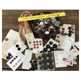 Tin full of buttons, thread etc