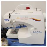 Black and yellow tub of sewing with white Quilt N