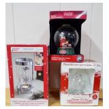 NOS Holiday items. Coca Cola rotating Santa