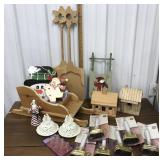 Flickering window candles, sled, birdhouses etc.