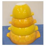 Graduating Pyrex yellow bowls