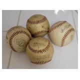 4 baseballs with many autographs but I can