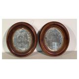 Two Walnut oval mirrors