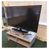 Samsung TV, Sony DVD/VCR, glass top tv stand