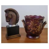 Flower pot and horse head statue