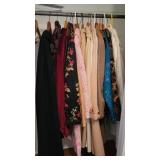 Contents of coat closet - ladies on the right