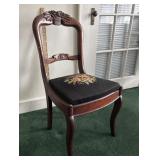 Rose carved chair with need needlepoint seat
