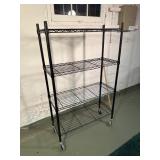 Adjustable rack on wheels 36x16x57.  4 of 5