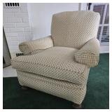 Overstuffed chair with bun feet